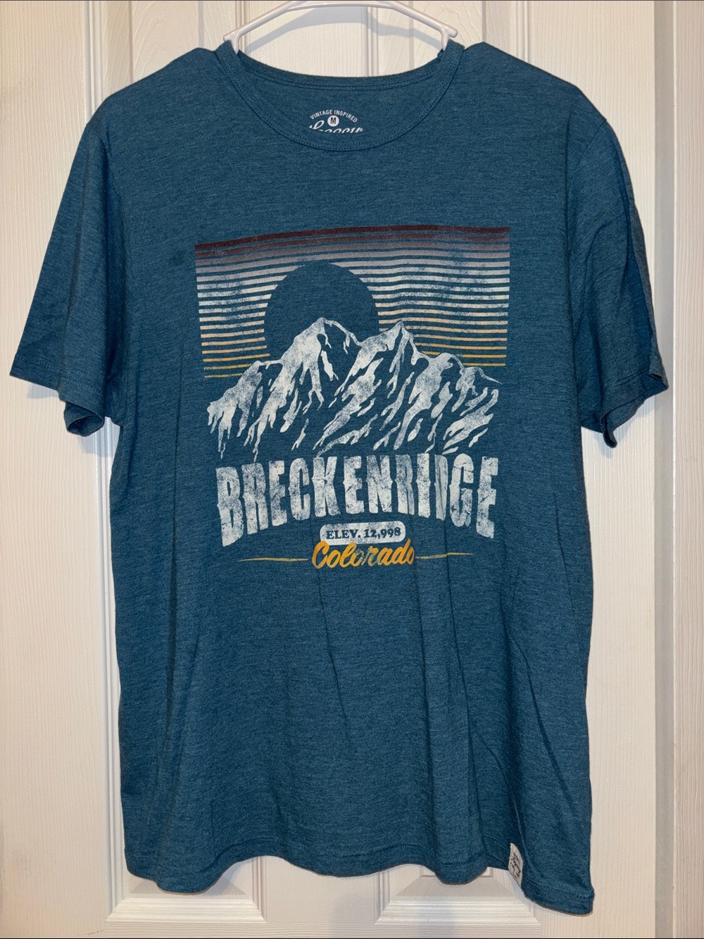 Legacy Teal Mountain Graphic Tee with Yellow Accent